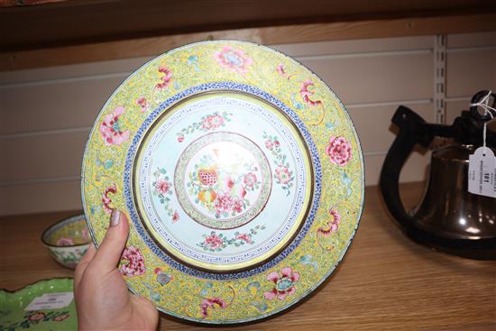 A Chinese Canton enamel brushwasher, two bowls and cover, four plates and three stands, 19th/20th century